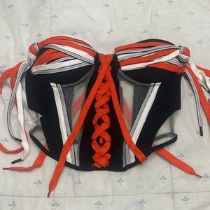 Strappy Black and Red Bustier Top
Never worn but popped off tags